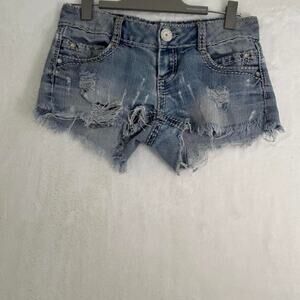 Almost Famous blue denim shorts with frayed hem and rhinestone details